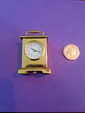 Miniature Brass Carriage Clock nice but will need battery .. bargain £3.70
