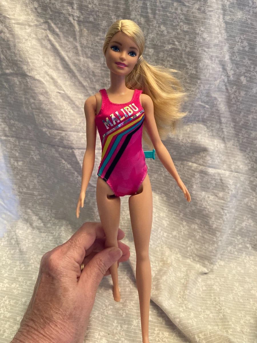 swimming Malibu Barbie doll. Mattel. Push the button she kicks her legs