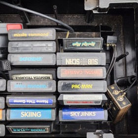 Atari 2600 VCS Lot w/Case+Joysticks+Paddles+Pac-Man+Space Invaders+Combat