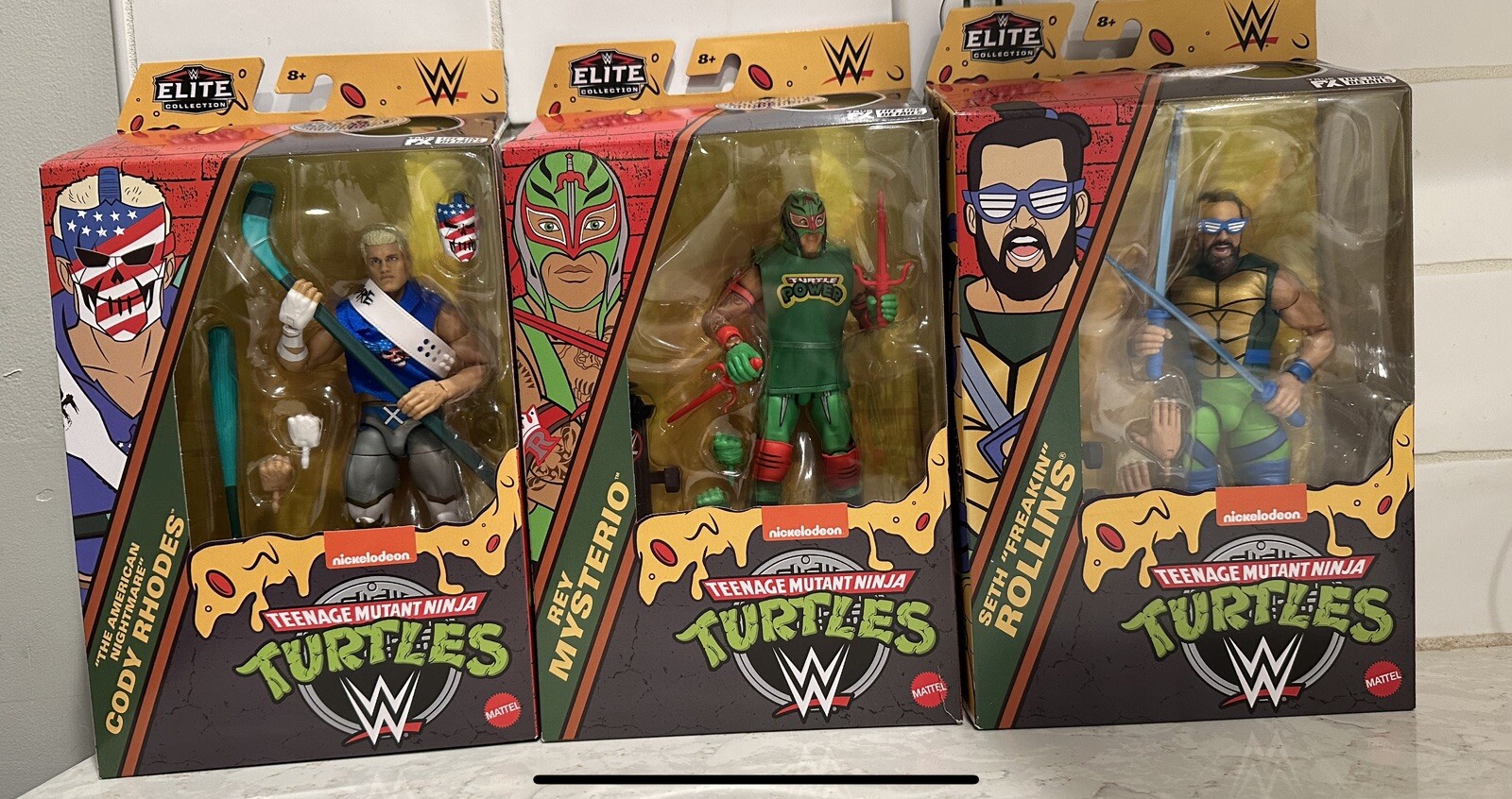 WWE TMNT Elite Cody Rhodes Seth Rollins Rey Mysterio NIB