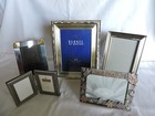 Five Silver Colored Frames in Variety of Sizes and Styles