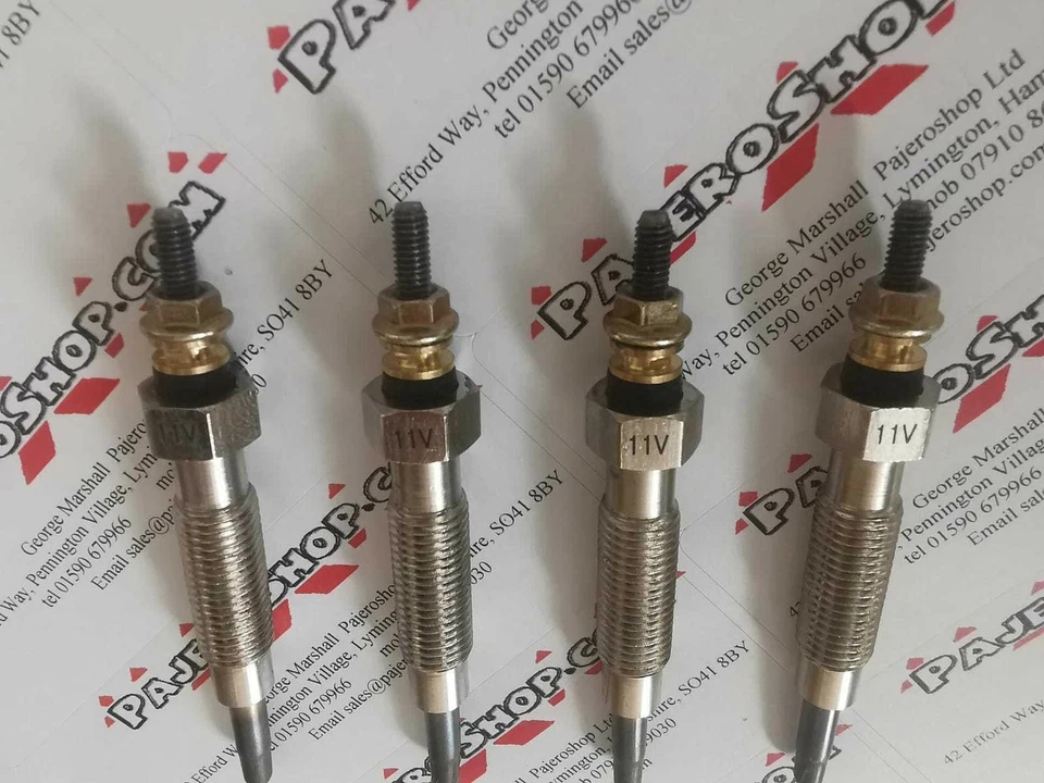  Juego de cuatro tapones brillantes de bobina de duelo Bosch OEM L200 2.5TD 4D56 1993-2006 Mitsubishi Foto 2 de 4