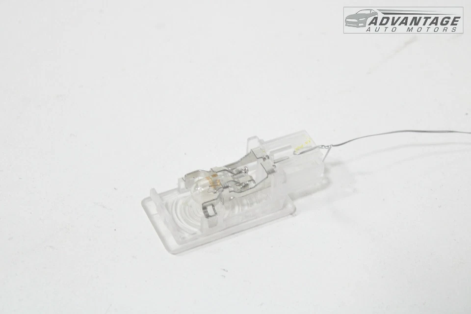 Cadillac ATS 2013-2018 panel de tablero interior inferior izquierdo lámpara de luz de cortesía OEM Foto 3 de 4