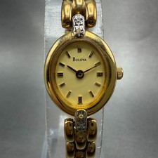 Bulova Watch Women 16mm Champagne Dial Gold Tone Oval 98R10 New Battery Diamonds