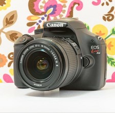 Canon Kiss X50 DSLR Camera 12.2MP HD Video Kit with Accessories and 32GB SD Card