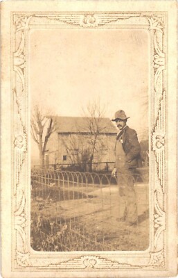 Man Farmer in Overalls Barn RPPC Real Photo Postcard Divided Back 1910s Unused