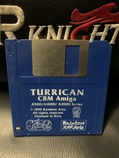 Gioco floppy disk Turrican Commodore Amiga testato funzionante Kixx