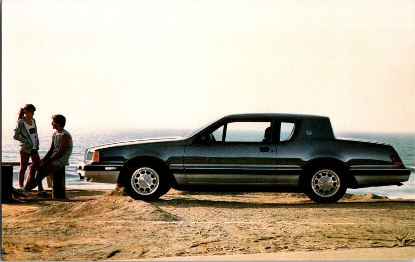 Vintage Postal Pareja en la playa con Ford Mercury Cougar XR7 F cougar 1986 Vintage Postal Pareja en la playa con Ford Mercury Cougar XR7 F