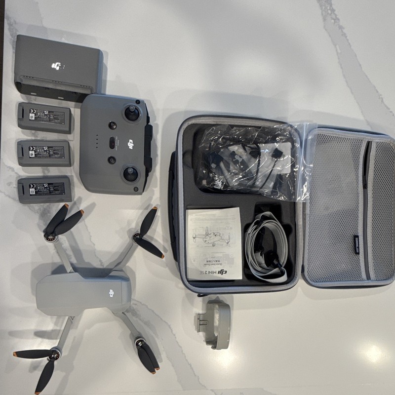 DJI Mini 2 SE Ready to Fly Camera Drone Bundle w/ Remote, 3 Batteries, Case.