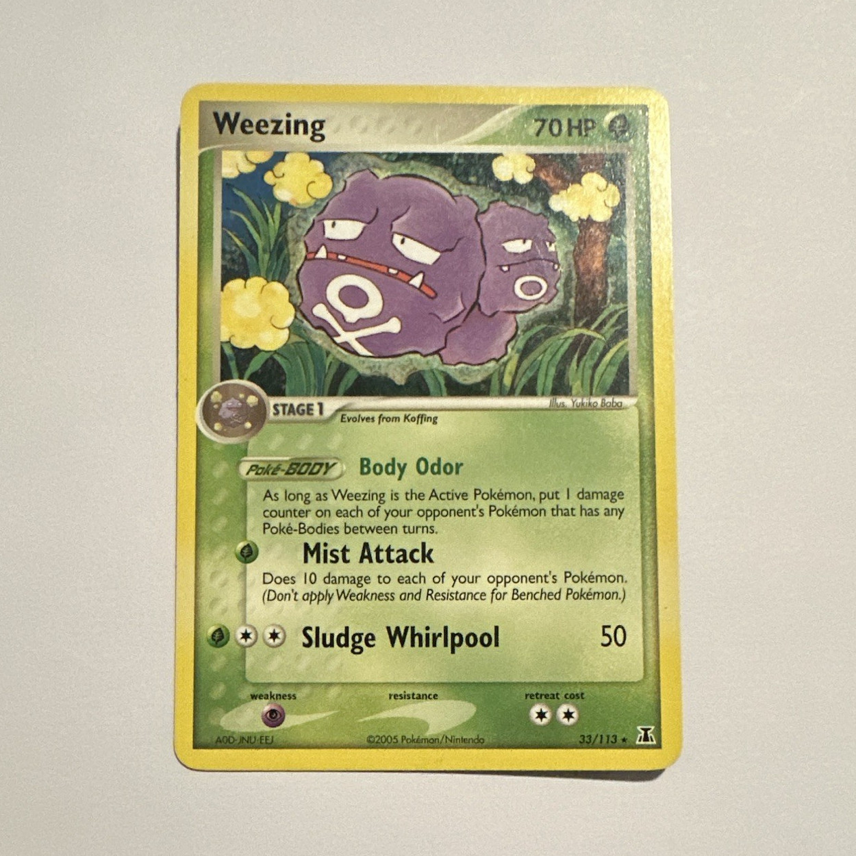 The Pokémon Company Weezing 33/113 Delta Species 2005 English Rare 70 HP
