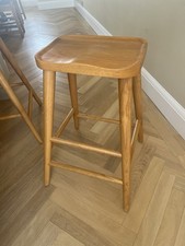 Laura James wooden bar stools x 2