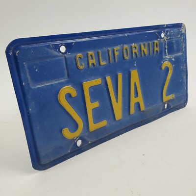 Vintage Pair of California Blue w/Yellow Vanity License Plates ''SEVA 2'' It Goes