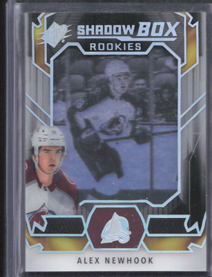 2021-22 SPx #SB-6 Alex Newhook Shadow Box Rookies