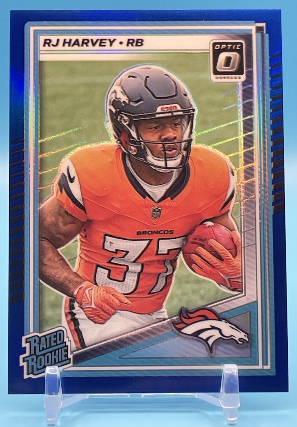 2025 Panini Donruss Optic Blue #208 RJ Harvey RC Rated Rookie /249 Broncos