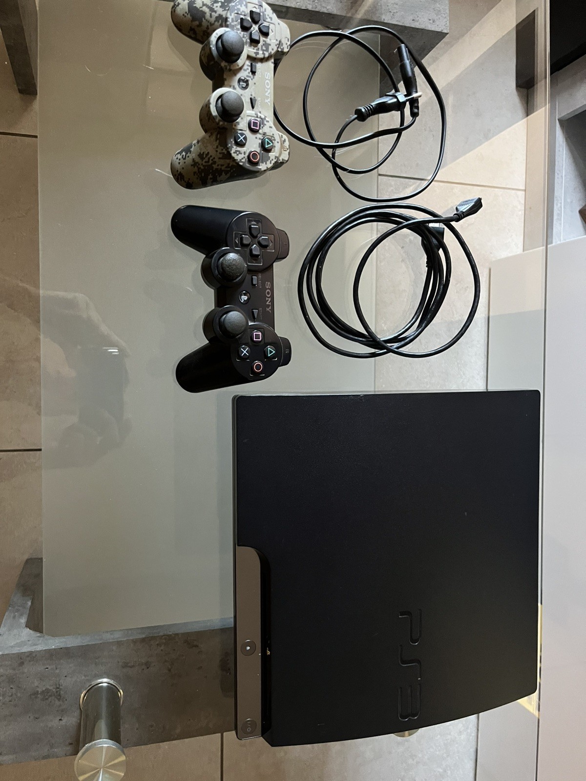 Sony PlayStation 3 Super Slim 500GB Console con Controller DUALSHOCK 3 - Nera
