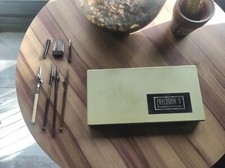 Compas vintage "Précision V" avec sa boite, complet + autres pièces diverses