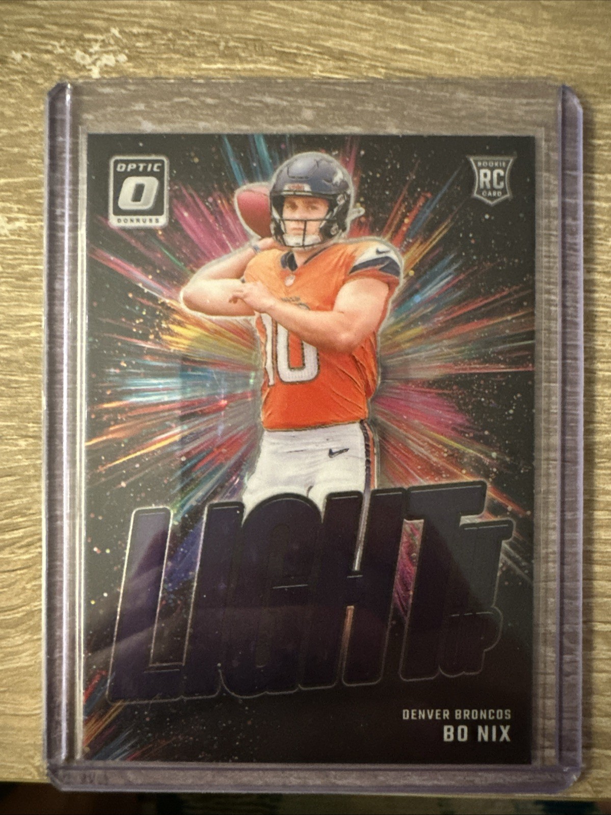 2024 Panini Donruss Optic Light It Up Bo Nix #6 Purple Stars Prizm /25 (RC)