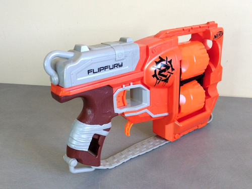 Pistola Nerf N-Strike Zombie Flipfury Naranja + 13 Dardos - Doble Cargador - Imagen 2 de 9