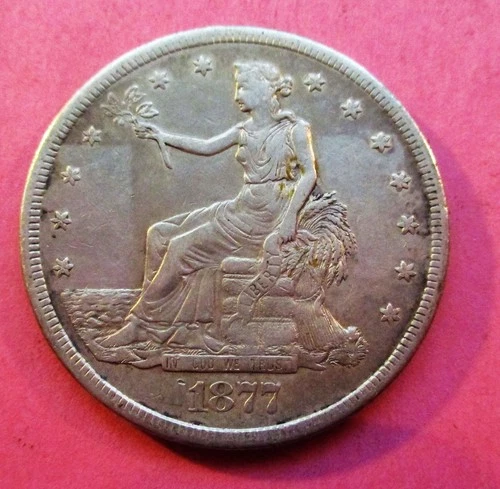 1877-S TRADE SILVER DOLLAR. FULL MOTTO AND LIBERTY. BEYYER GRADE.