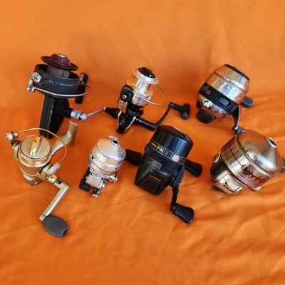7 Fishing Reel Lot Various Brands Spinning Spincast DAM Quick Finessa Used