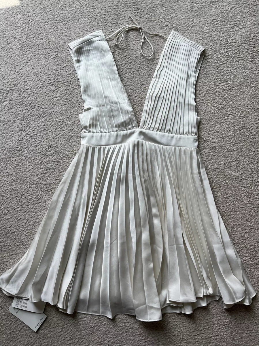 White pleated mini shop dress