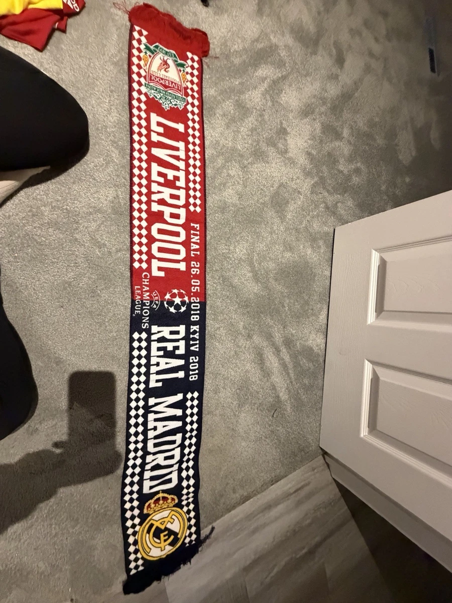 Fans of Atletico de Madrid wave their scarves during the UEFA