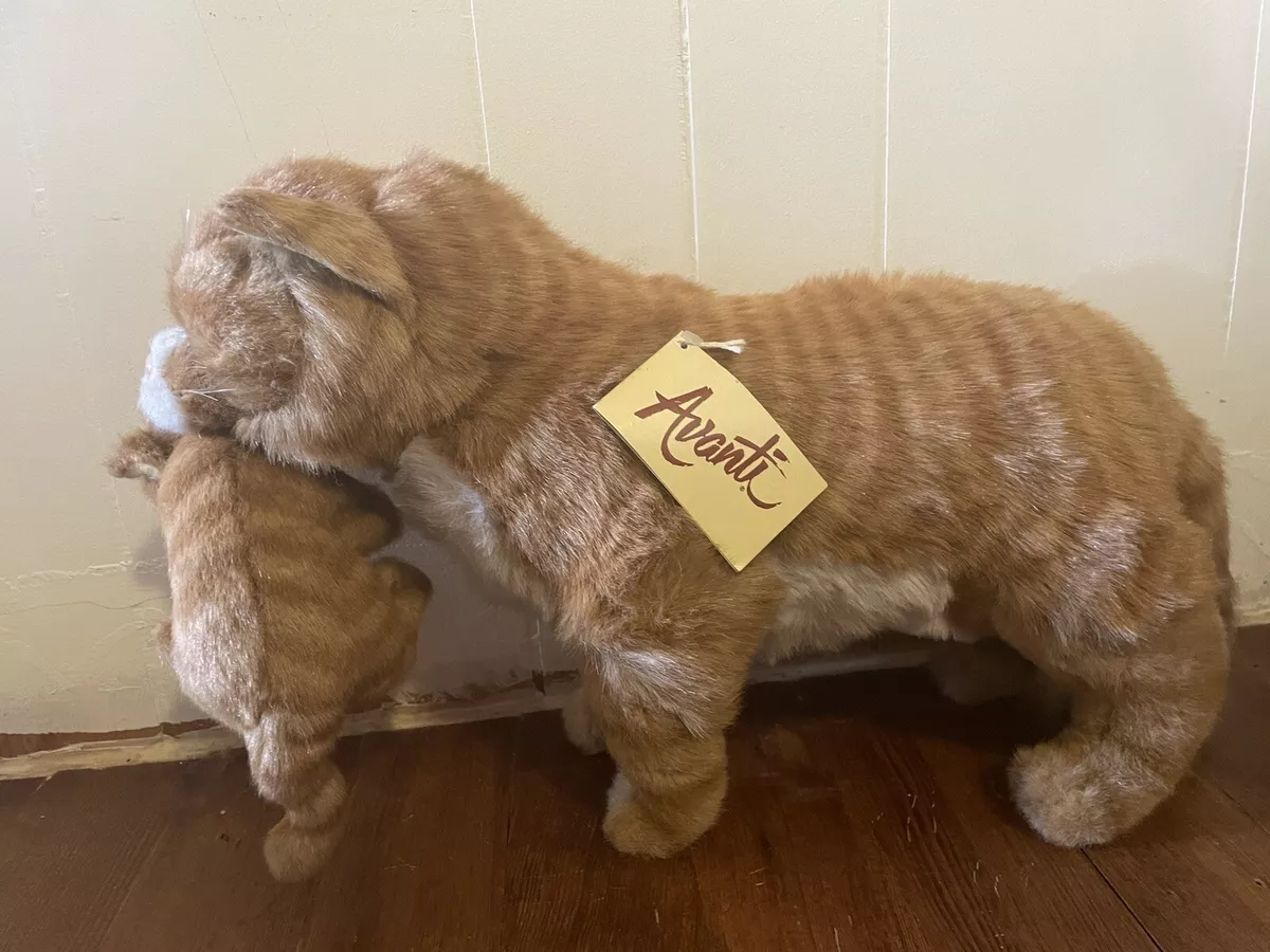 Cat carrying top stuffed animal