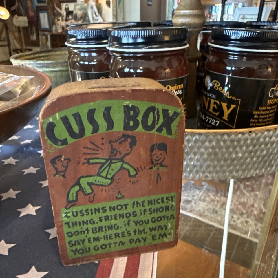 Hand-painted folk art swear jar that charges you a coin every time you curse — functional, funny, and actually a one-of-a-kind handmade object.