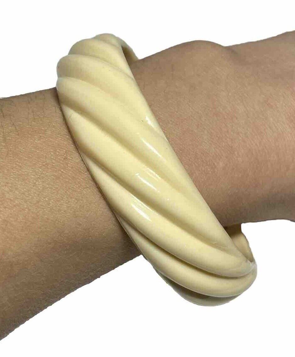 Chunky Swirled Carved 70's Vintage Ivory Resin Bangle Chunky Swirled Carved 70's Vintage Ivory Resin Bangle