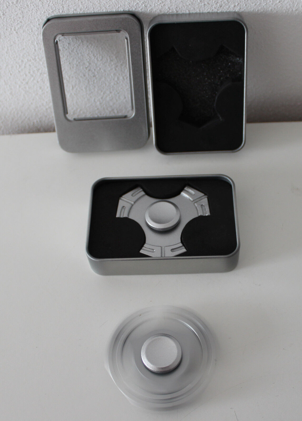 Fidget Slider Münze Von Fockety - Magnetisches Stress Spielzeug Mit Knack-Geräusch Silberschwarz