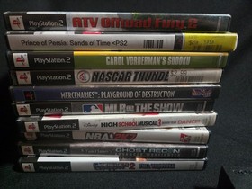 PS2 Slim Console, 2 Controllers, 11 Games, & Cords . Must See!