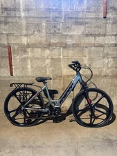 NEW Hyper 700C E-Ride City Electric Bike – 36V Mid-Drive, Disc Brakes, Rear Rack