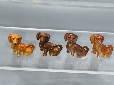 Altfiguren Tiere Hunde 4 verschiedene Varianten Dackel sitzend