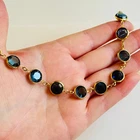 VTG Costume Jewelry Bracelet Blue sapphire crystal open bezel high end regal 7"