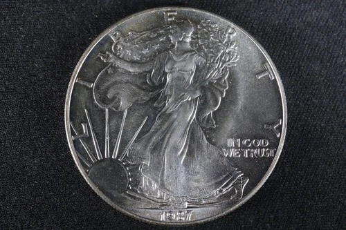 NobleSpirit GEM BU 1987 American Silver Eagle .999 1oz Light Toning on Edges