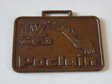 poclain brass excavator  watch fob metal arts co. vintage heavy equiptment