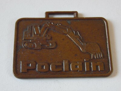 poclain brass excavator  watch fob metal arts co. vintage heavy equiptment