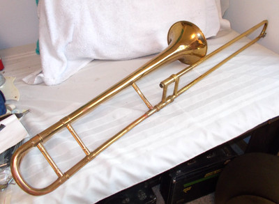 Frank Holton model 65 brass Trombone w/ Non original case good used condition