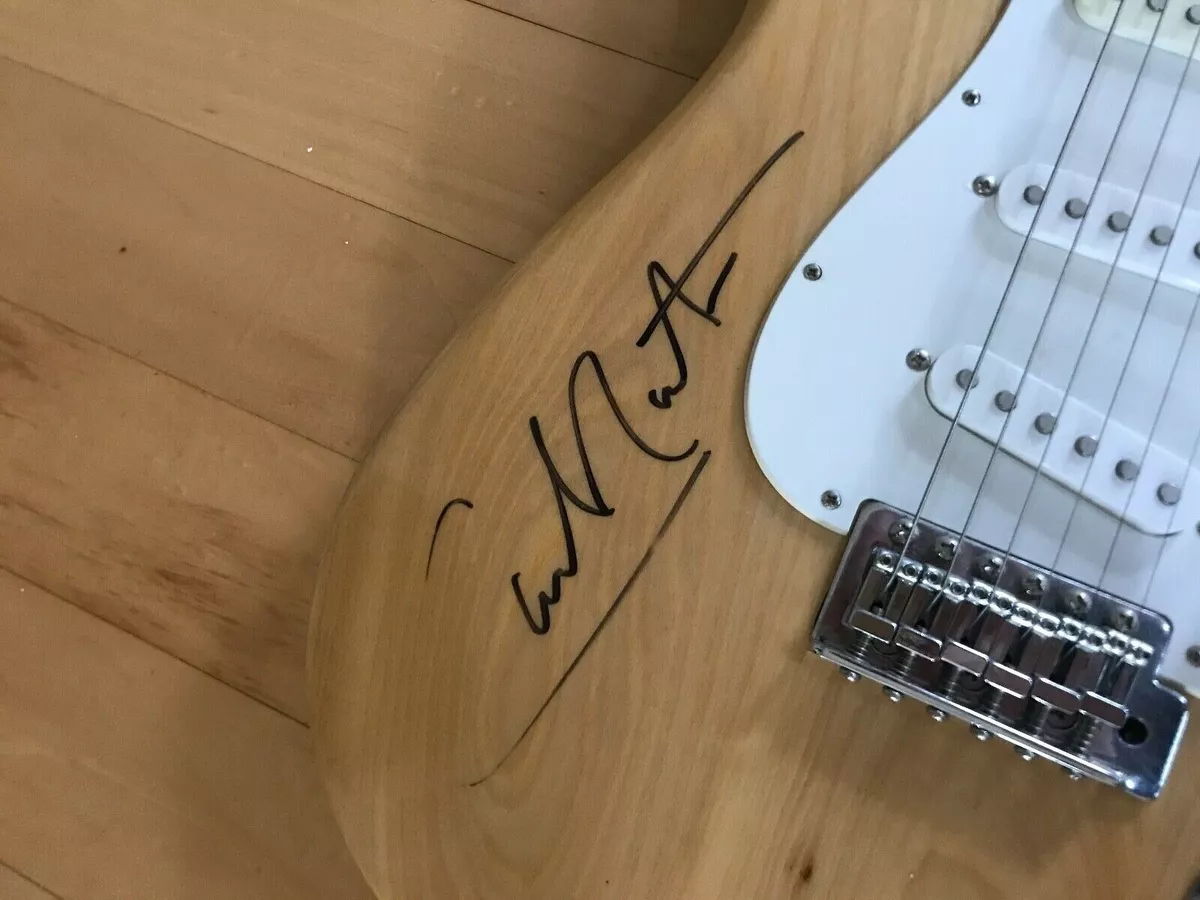 Carlos santana cheap signed guitar