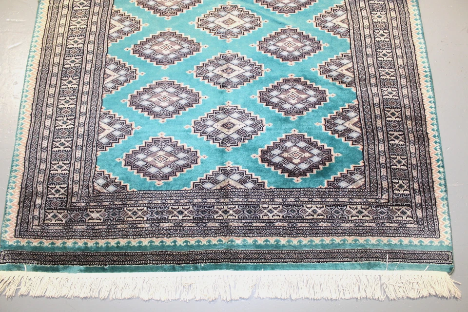 Alfombra hecha a mano Bokhara verde azulado Pakistán 3' 12" x 5' 10" alfombra azul anudada a mano Foto 2 de 4