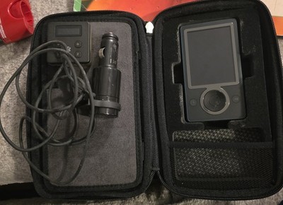 First-generation Microsoft Zune 30GB, Bundled With Case and Car Charger.