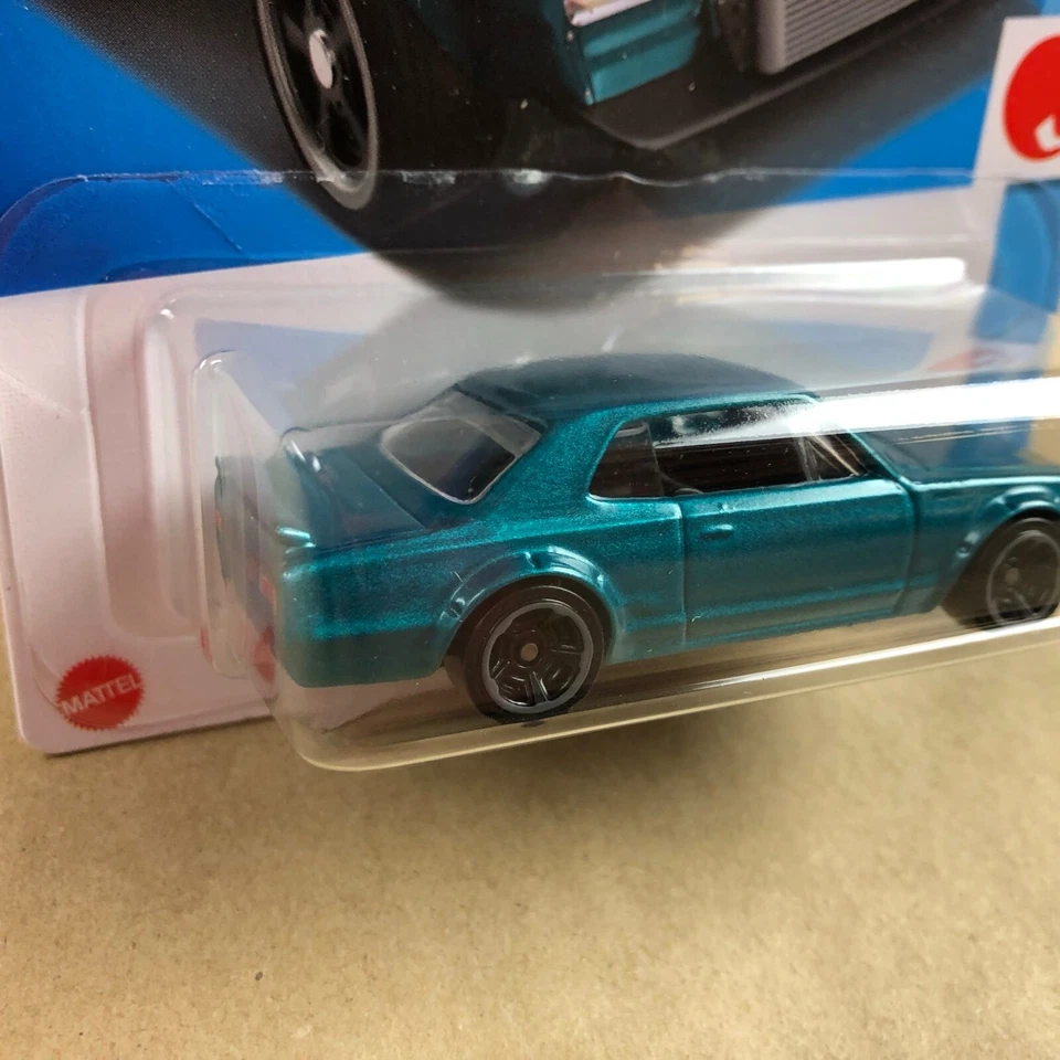 Coche fundido a presión Hot Wheels Tampo Error Nissan Skyline HT 2000GT-X verde 187/250 Foto 3 de 4