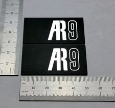 AR-9 Speaker Grill Badges Emblem Premium Silver 3D Pair With Self Stick Adhesive