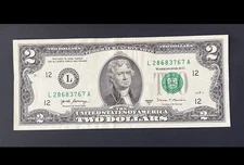 ERROR $2 DLL BILL - OVERINK ON SERIAL #: "6", FRB L12, 2017A, CIRC.