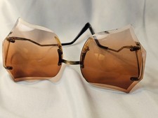 vintage 1970s style oversized rimless sunglasses