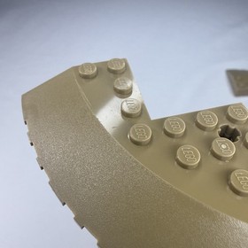 LEGO Brick Round Corner 10 x 10 w. Slope 33 Edge Axle Hole (x2) Dark Tan 58846