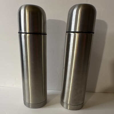 2pc Stainless Insulated Thermos. One is flawed rubber cup comes out when open