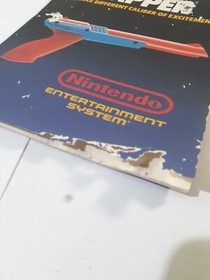 Nintendo NES Zapper Instruction Manual Booklet Only Has Some Damage On Cover.   