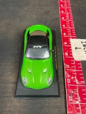 1:43 scale diecast model of a Ferrari 599 HY-KERS Green