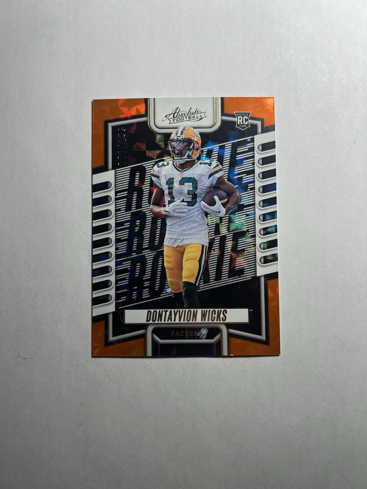 2023 Panini Absolute - Rookies Dontayvion Wicks #199 Orange Mosaic /299 (RC)